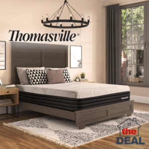 Thomasville 13" Hybrid Mattress staged in a modern bedroom with wood frame bed and stylish décor.